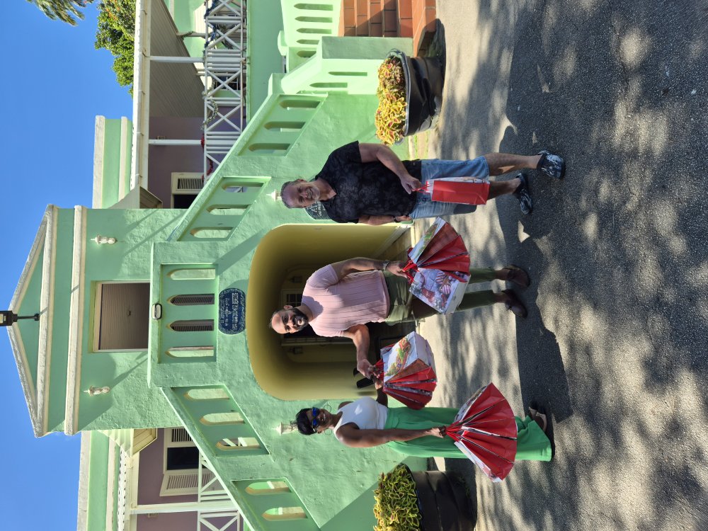 Asokore Beckles delivering a Christmas donation on behalf of the Village Foundation to Vedun House, 2025