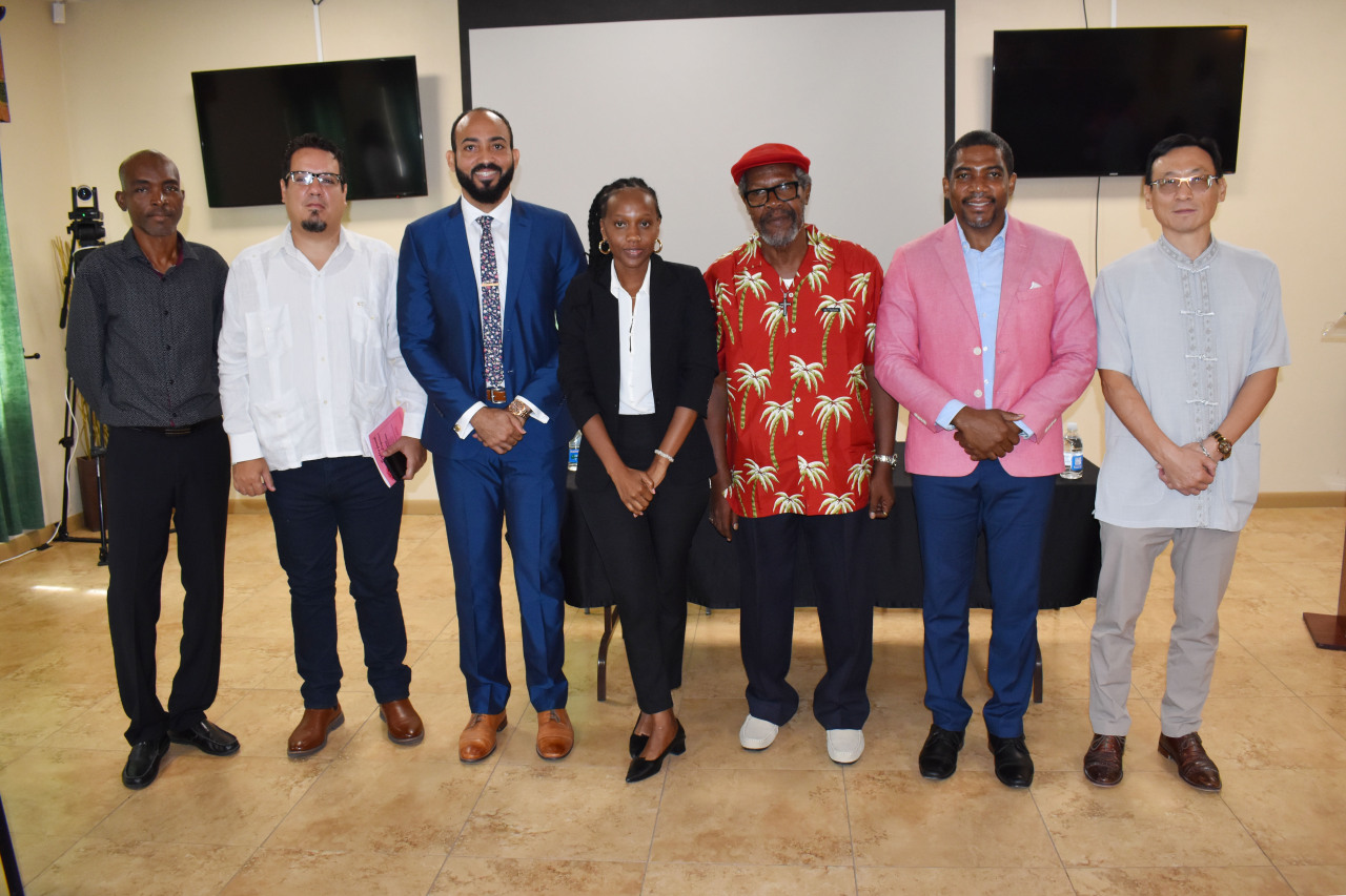 Asokore Beckles as featured speaker at the Saint Kitts Nevis Trades and Labour Union 2023 Annual Conference, with Prime Minister Dr Terrance Drew of Saint Kitts and Nevis, the SKNT&LU President, General Secretary, and other members of the delegation